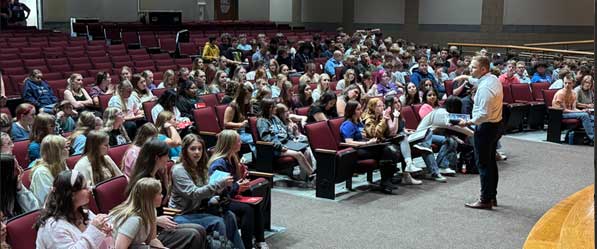 students in auditorium seats