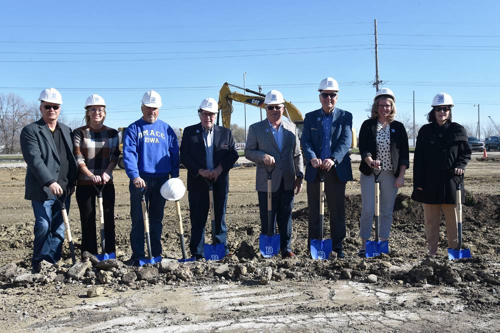 DMACC officials and partners from the public and private sectors (pictured above) participate in a Nov. 14 groundbreaking for a new $9 million DMACC Transportation Institute on Des Moines’ north side. The 8,600-square-foot facility will be named after DMACC alumnus and Agribusiness executive Dennis Albaugh, who donated $1 million to the project. Additional funding includes a $1 million grant from the State of Iowa; a $500,000 donation from the Kent Corporation; and a $50,000 donation from Bob and Jane Sturgeon. Pictured (left to right) are Del Stevens, DLR Group; Megan Ellsworth, Director of Industry and Technology at DMACC; Joe Pugel, DMACC Board Chair; Steve Van Oort, Polk County Supervisor; Dennis Albaugh, DMACC alumnus and Agribusiness executive; Rob Denson, DMACC President; Dr. Jenny Foster, Executive Academic Dean of Industry and Technology at DMACC; and Beth Townsend, Iowa Workforce Development Executive Director.
