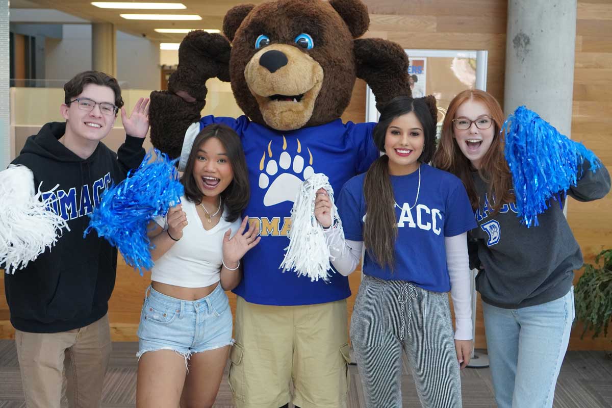 DMACC students with the bear